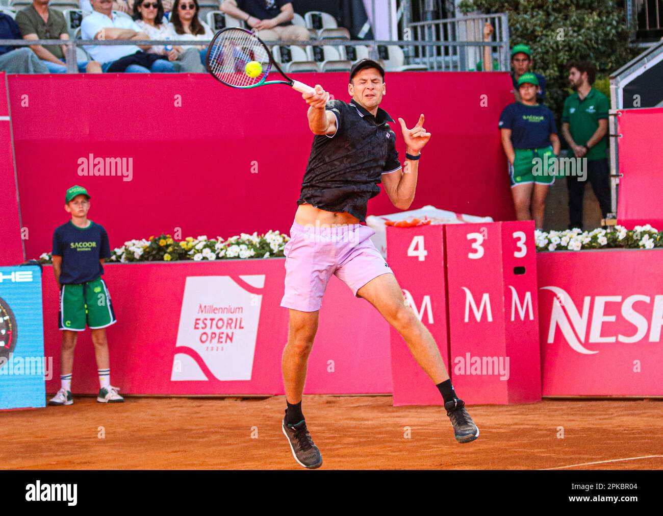 Estoril, Portugal. 06th Apr, 2023. Hubert Hurkacz of Poland plays against  Bernabe Zapata Miralles of Spain during the 2nd round of the Millennium  Estoril Open tournament at CTE- Clube de Ténis do