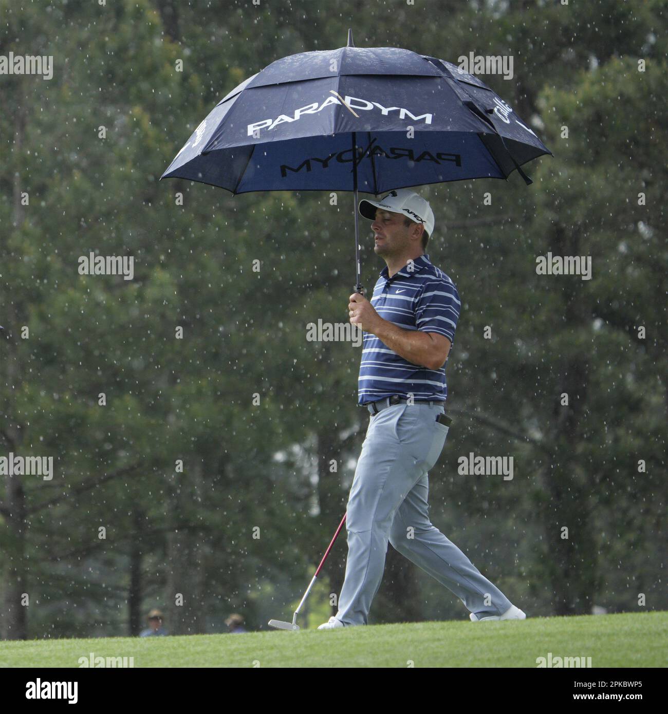Augusta, United States. 06th Apr, 2023. Francesco Molinari of Italy walks under an umbrella during the first round at the Masters tournament at Augusta National Golf Club in Augusta, Georgia on Thursday, April 6, 2023. Photo by Bob Strong/UPI Credit: UPI/Alamy Live News Stock Photo