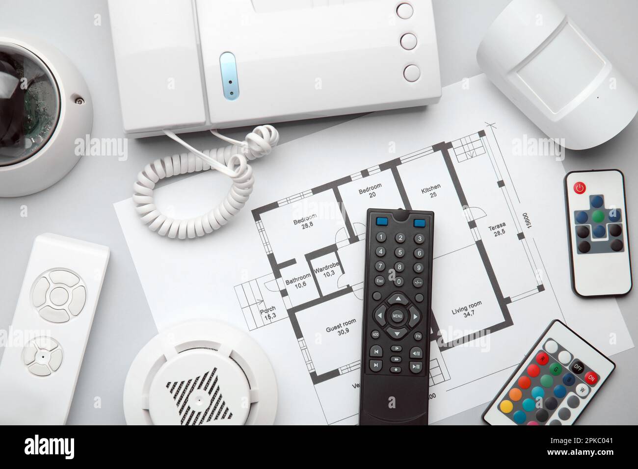 Remote controls, intercom, building plan, smoke and movement detectors ...