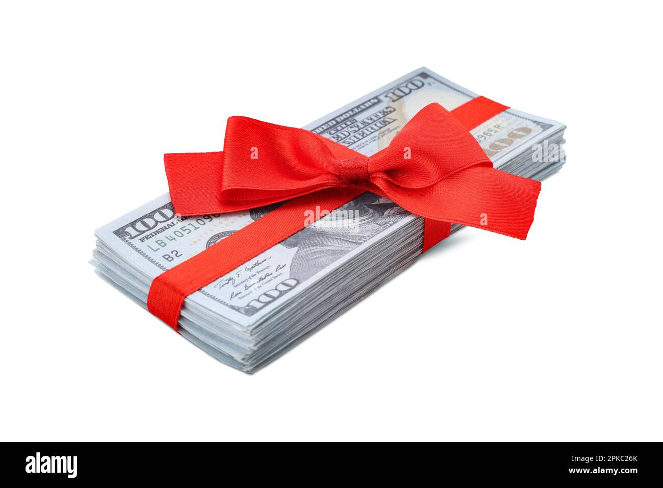 Stack of dollar banknotes with red ribbon isolated on white Stock Photo ...