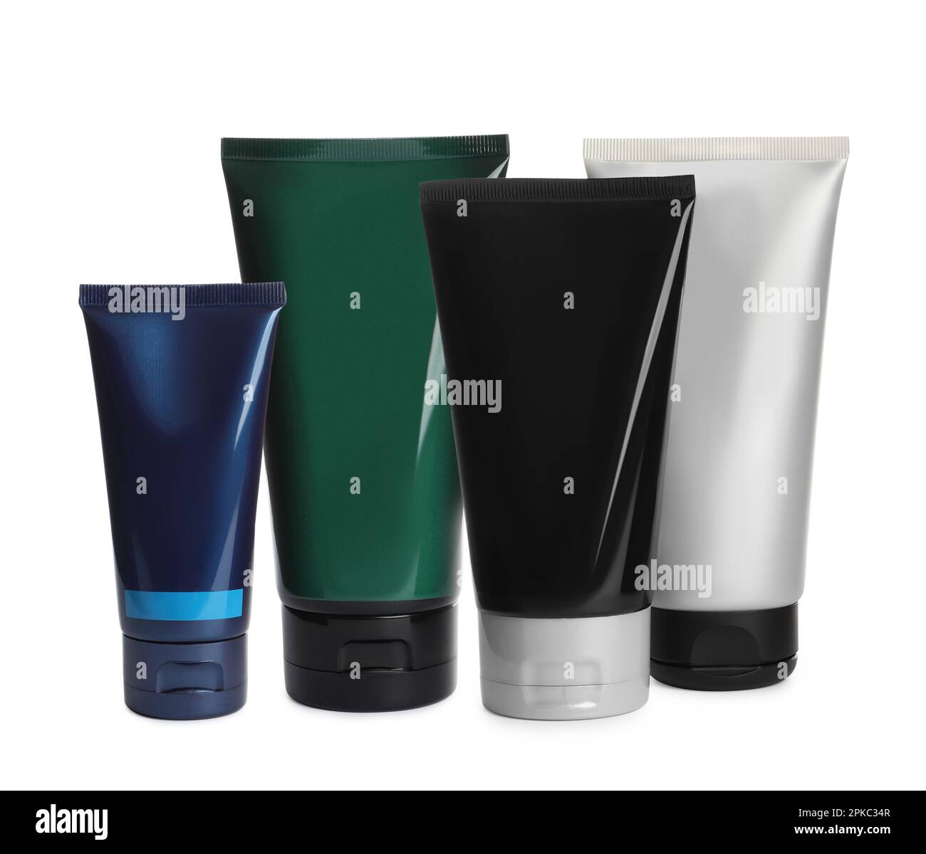 Set with tubes of facial cream on white background Stock Photo - Alamy