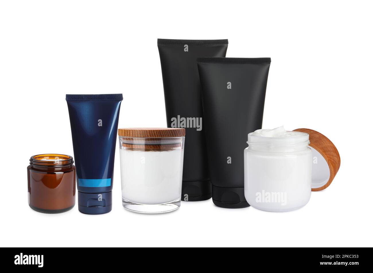 Set with tubes and jars of facial cream on white background Stock Photo ...