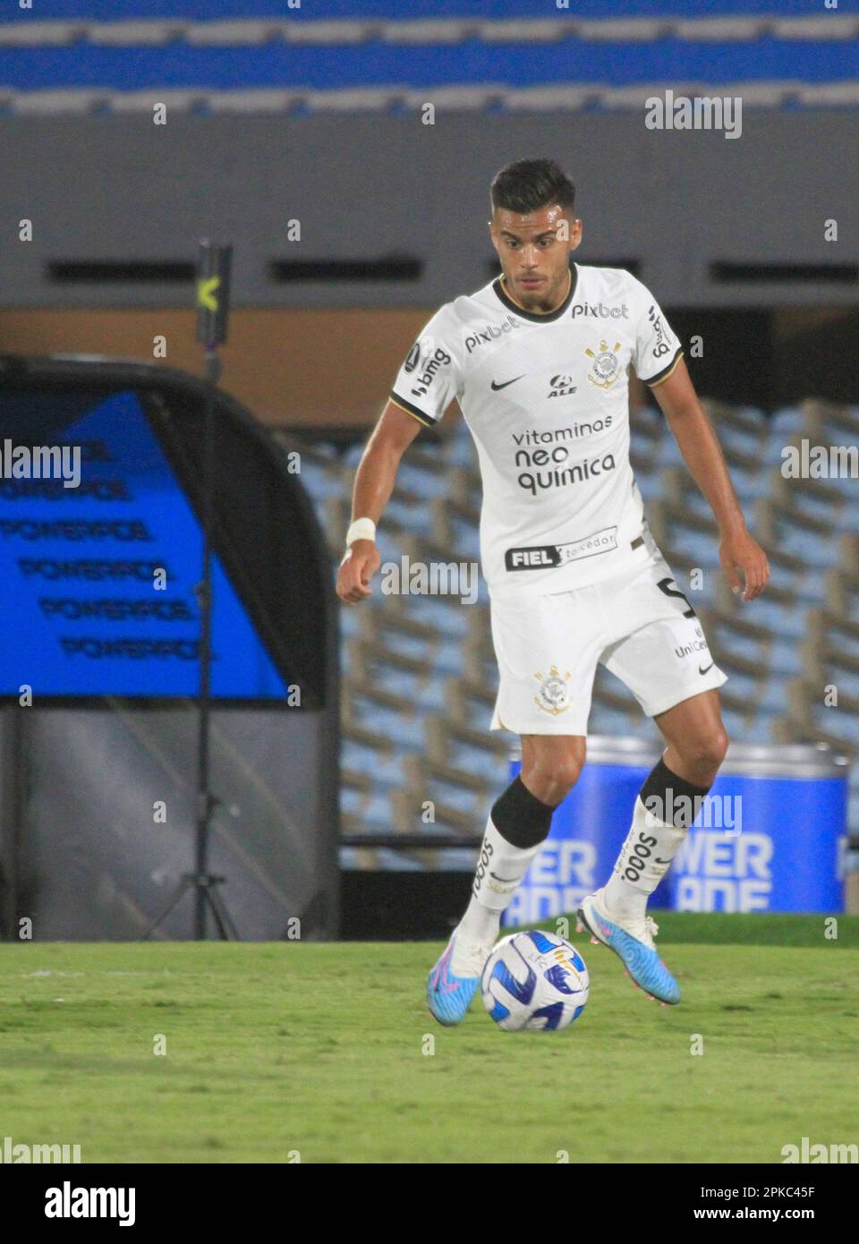 Montevideo, Uruguay, 06th Apr, 2023. Gaston Martirena of Liverpool battles  for possession with Yuri Alberto of Corinthians, during the match between  Liverpool and Corinthians for the 1st round of Group E of