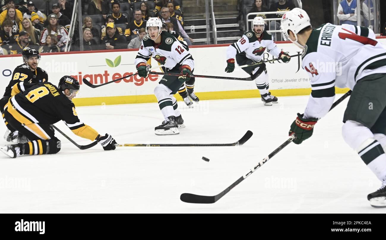 Pittsburgh, United States. 06th Apr, 2023. Minnesota Wild center Joel Eriksson Ek (14) takes the pass from Minnesota Wild left wing Matt Boldy (12) in front of Pittsburgh Penguins defenseman Brian Dumoulin (8) during the first period at PPG Paints Arena in Pittsburgh on Thursday, April 6, 2023. Photo by Archie Carpenter/UPI Credit: UPI/Alamy Live News Stock Photo