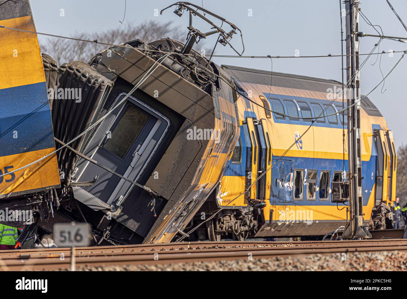 Voorschoten, Netherlands. 04th Apr, 2023. A view of a damaged carriage. A train collided with heavy construction equipment and derailment of the carriages near Leiden and the Hague. The Dutch railway crash resulted deadly, killing one person and injuring 30. Emergency services workers and police were on the scene to assess the damage. The accident took place in Voorschoten in the Netherlands. Credit: SOPA Images Limited/Alamy Live News Stock Photo