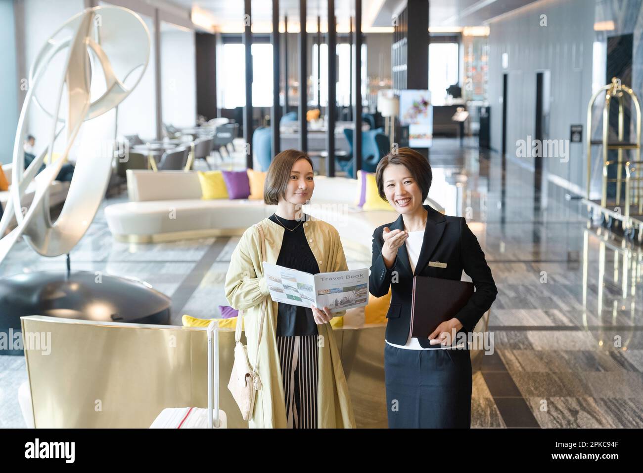 Guests and Hotel Staff Stock Photo - Alamy
