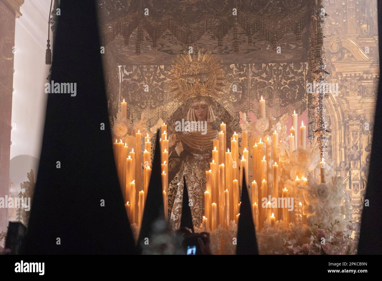 The Virgen de la Esperanza de Triana ready to begin her penitential ...