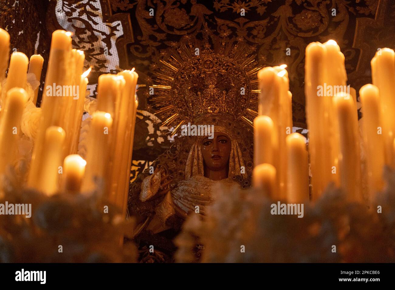 The Virgen de la Esperanza de Triana leaves the door of her chapel to ...