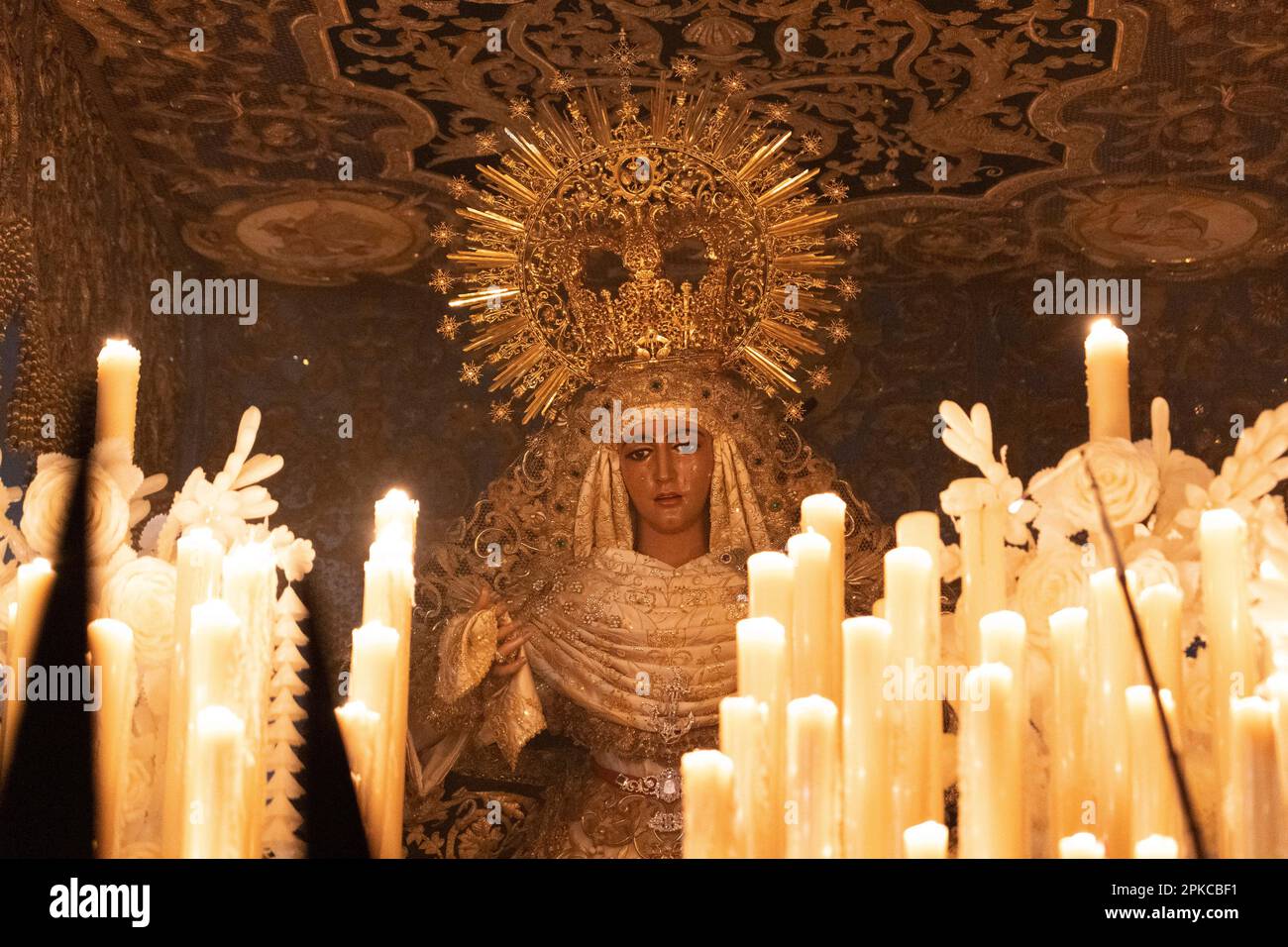 The Virgen de la Esperanza de Triana leaves the door of her chapel to ...
