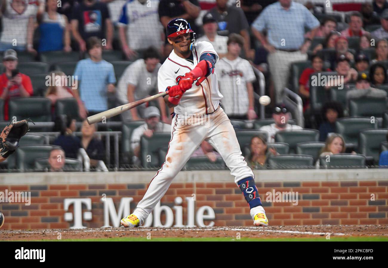 Atlanta, United States. 31st Oct, 2021. Atlanta Braves Ozzie Albies (1)  hugs teammate Eddie Rosario after both scored on Braves center fielder Adam  Duvall's grand slam against the Houston Astros during the