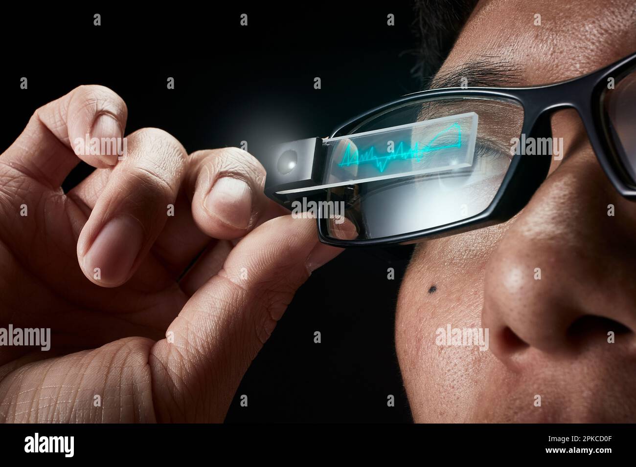 Man wearing smart glasses Stock Photo Alamy