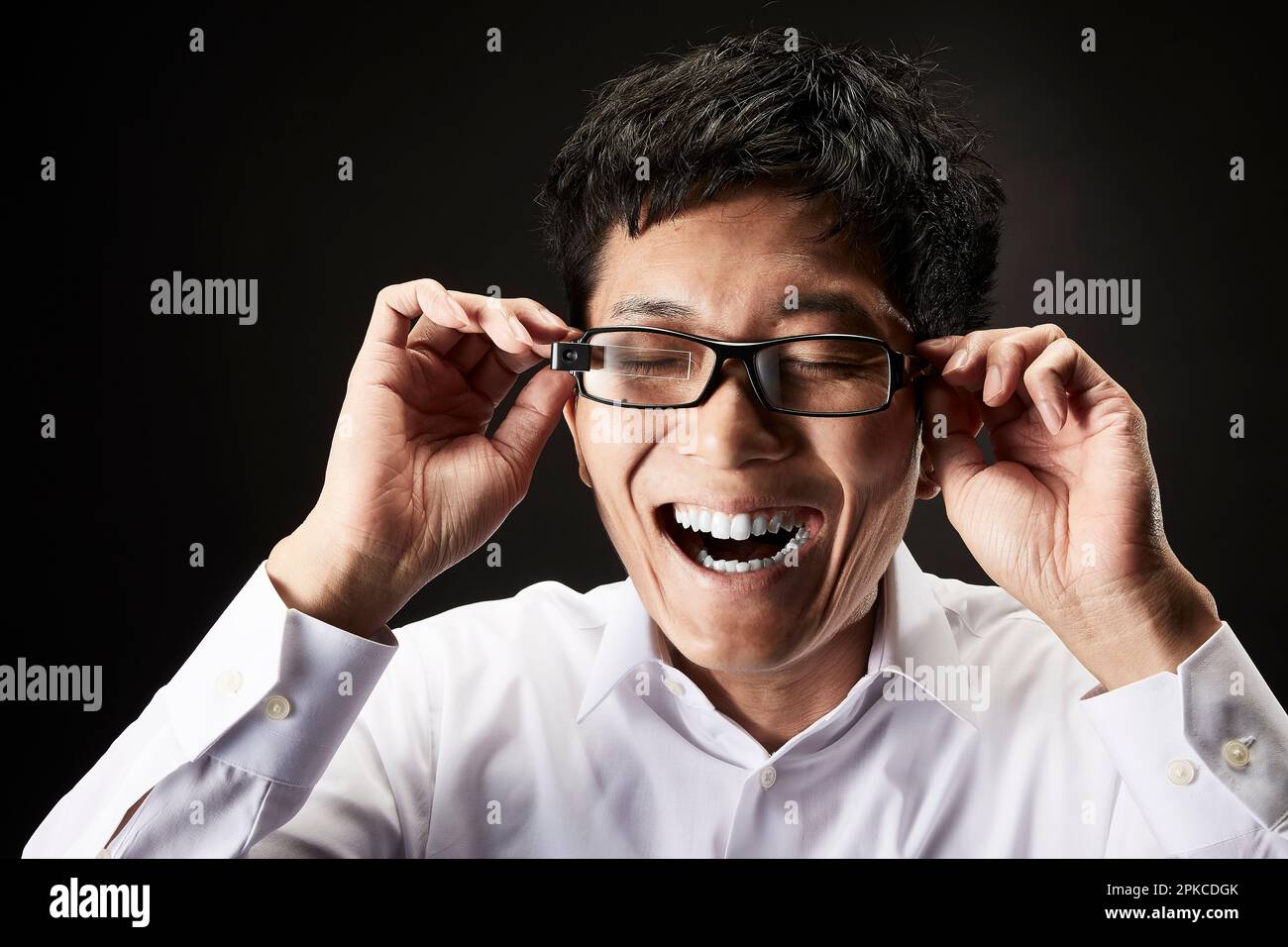 Man wearing smart glasses Stock Photo