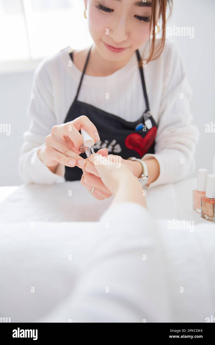 Manicure salon asian hi res stock photography and images Alamy