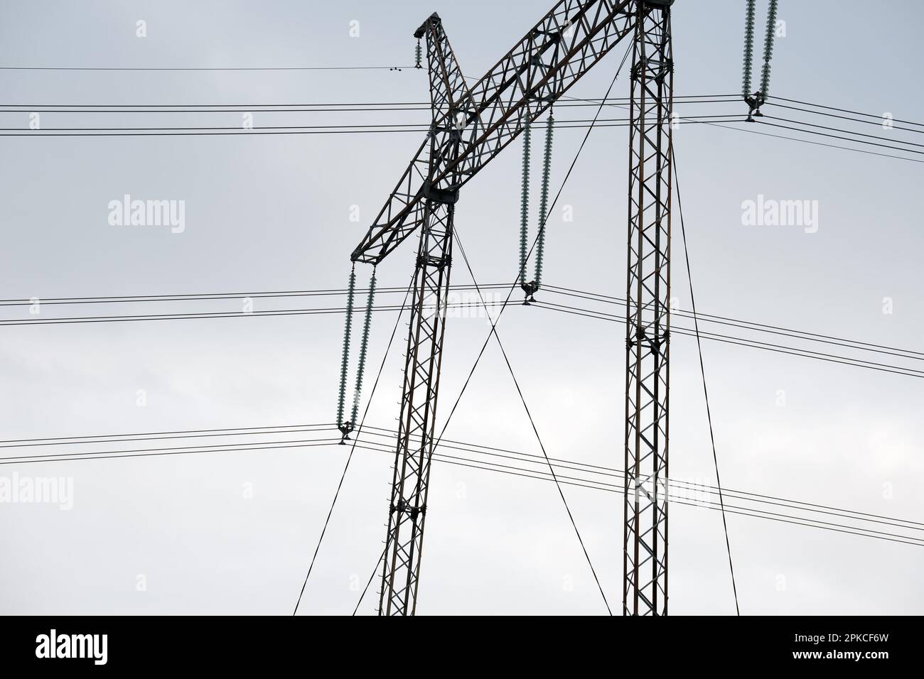 High voltage power line with insulation divider of electric power wires