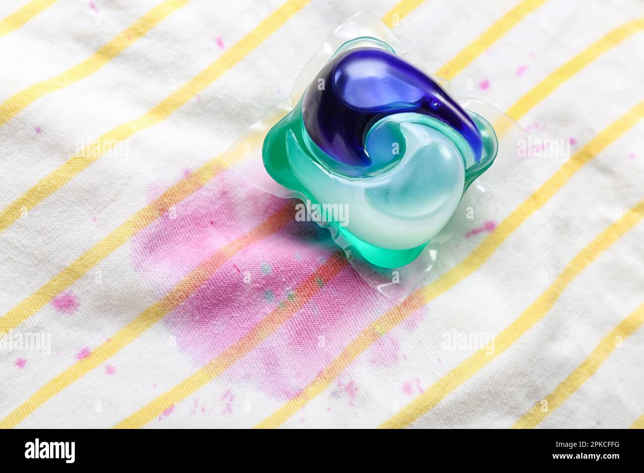 Laundry detergent on stained clothes, closeup Stock Photo Alamy