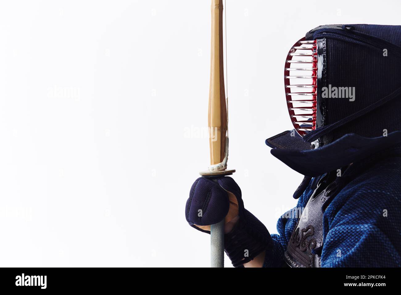 A man wearing a dogi in kendo stance Stock Photo Alamy