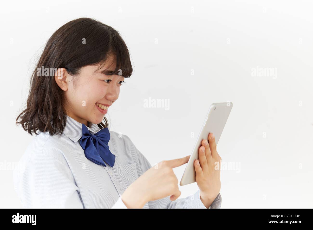 Asian teen girl tablet hi-res stock photography and images - Alamy