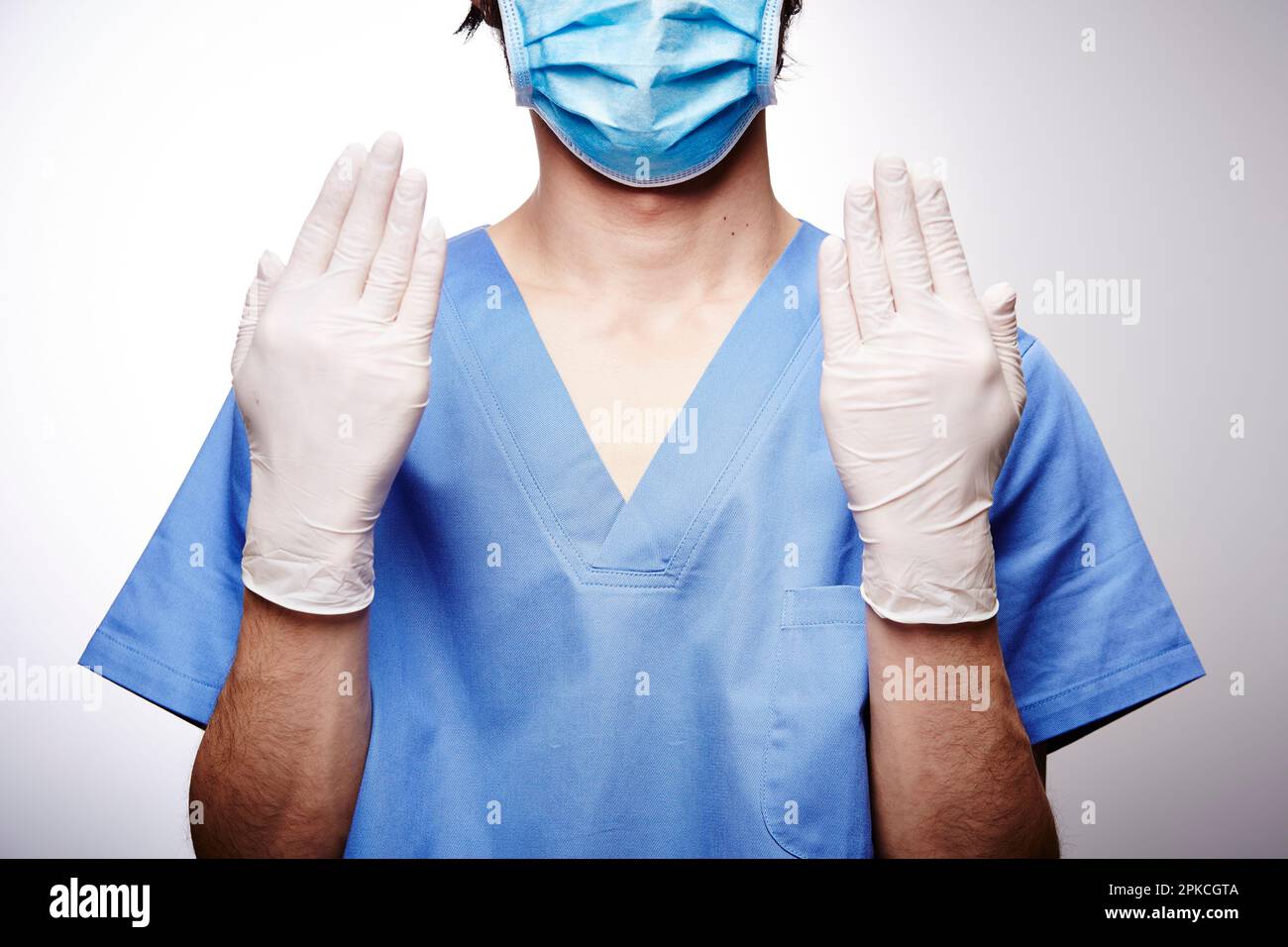 Male doctor in surgical suit Stock Photo
