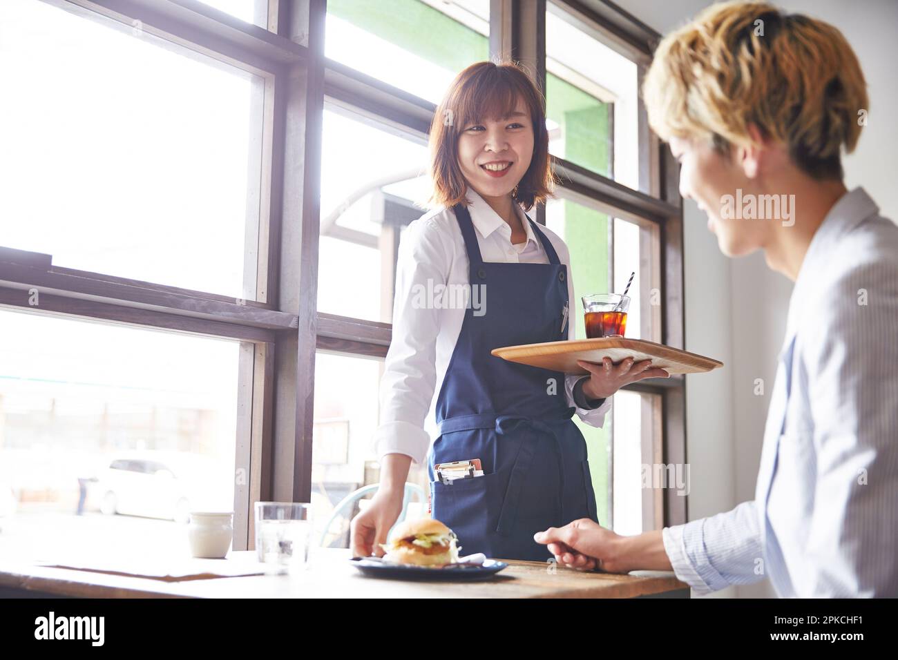 cafe-staff-serving-food-stock-photo-alamy