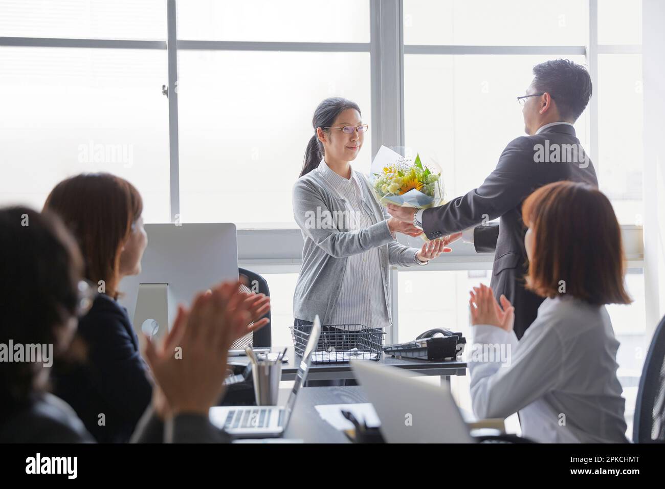 An employee sending a bouquet of flowers as a retirement gift and his