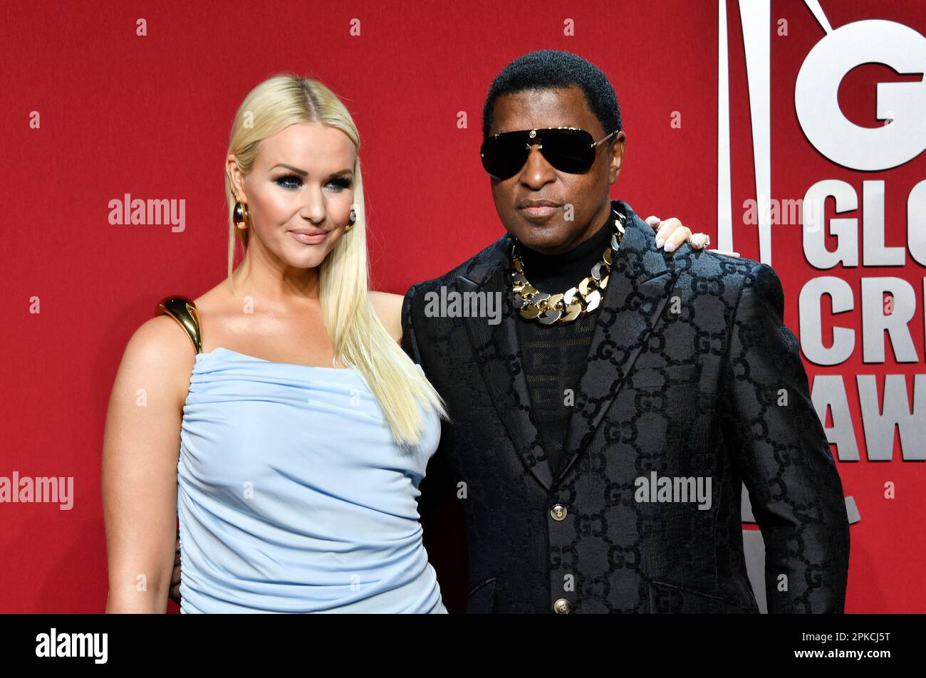 "Babyface" Edmonds, right, and girlfriend Rika attend the GQ