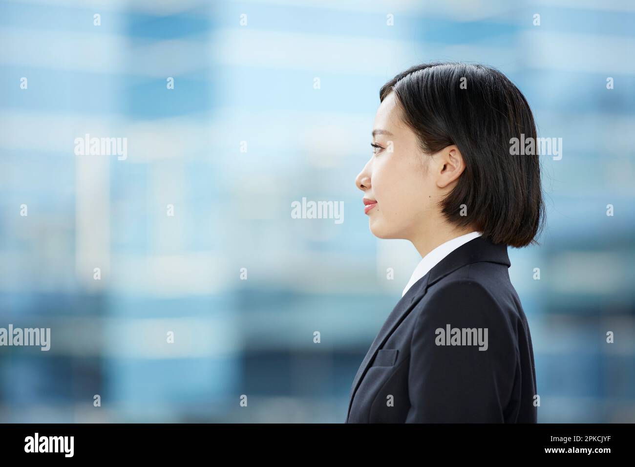 Smiling Woman in Recruit Suit Stock Photo