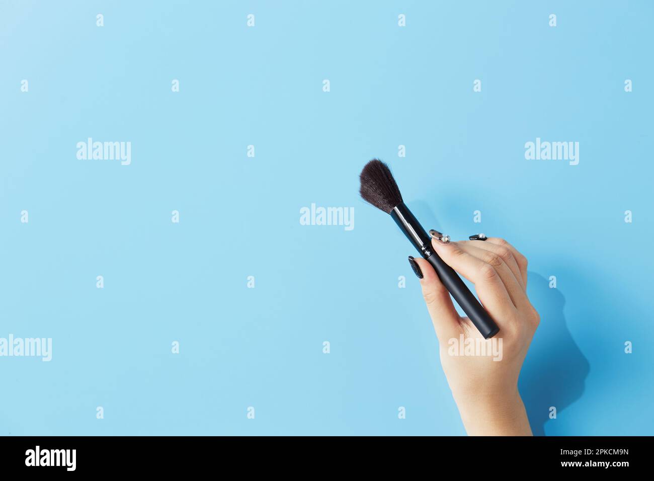 Womans hand holding brush hi-res stock photography and images - Alamy
