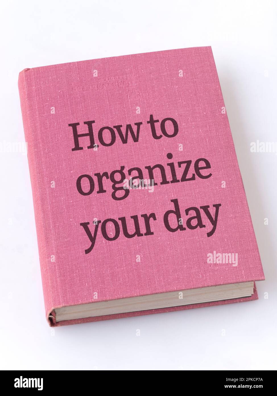 how to organize day phrase printed on textile book cover Stock Photo