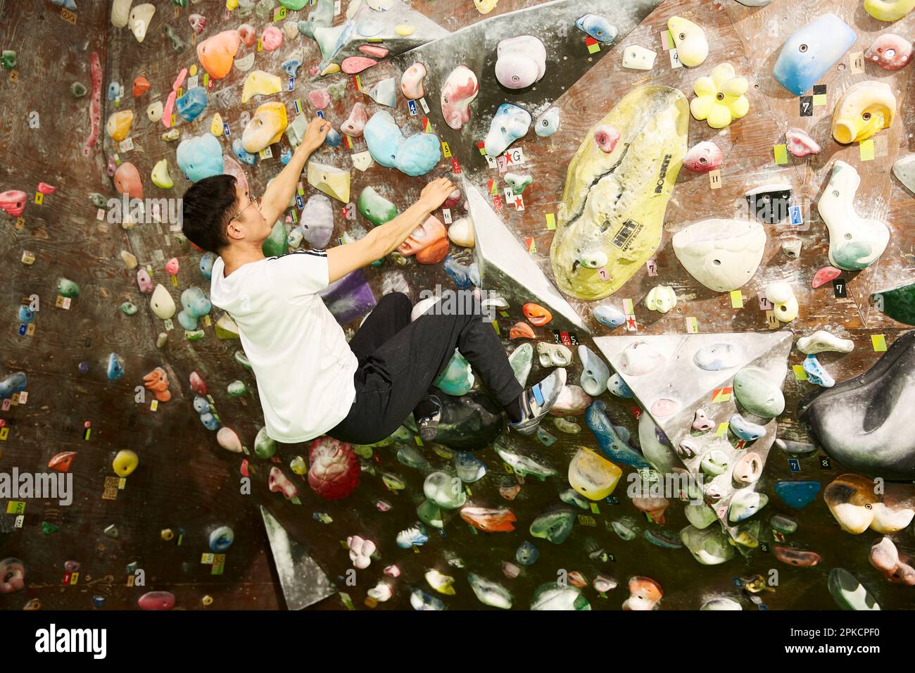 Man climbing overhang Stock Photo Alamy