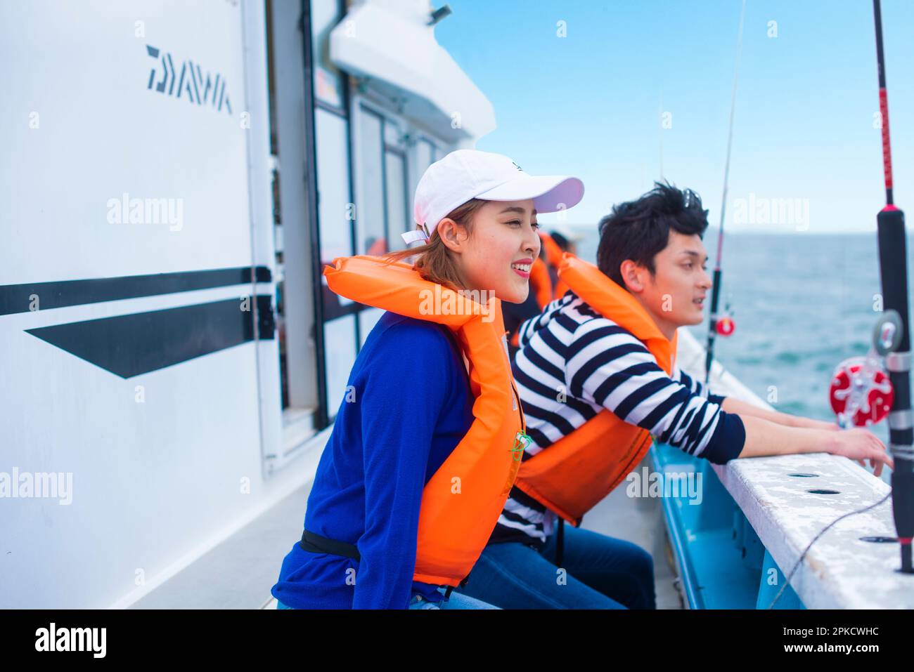 Two men fishing in a boat hi-res stock photography and images - Alamy