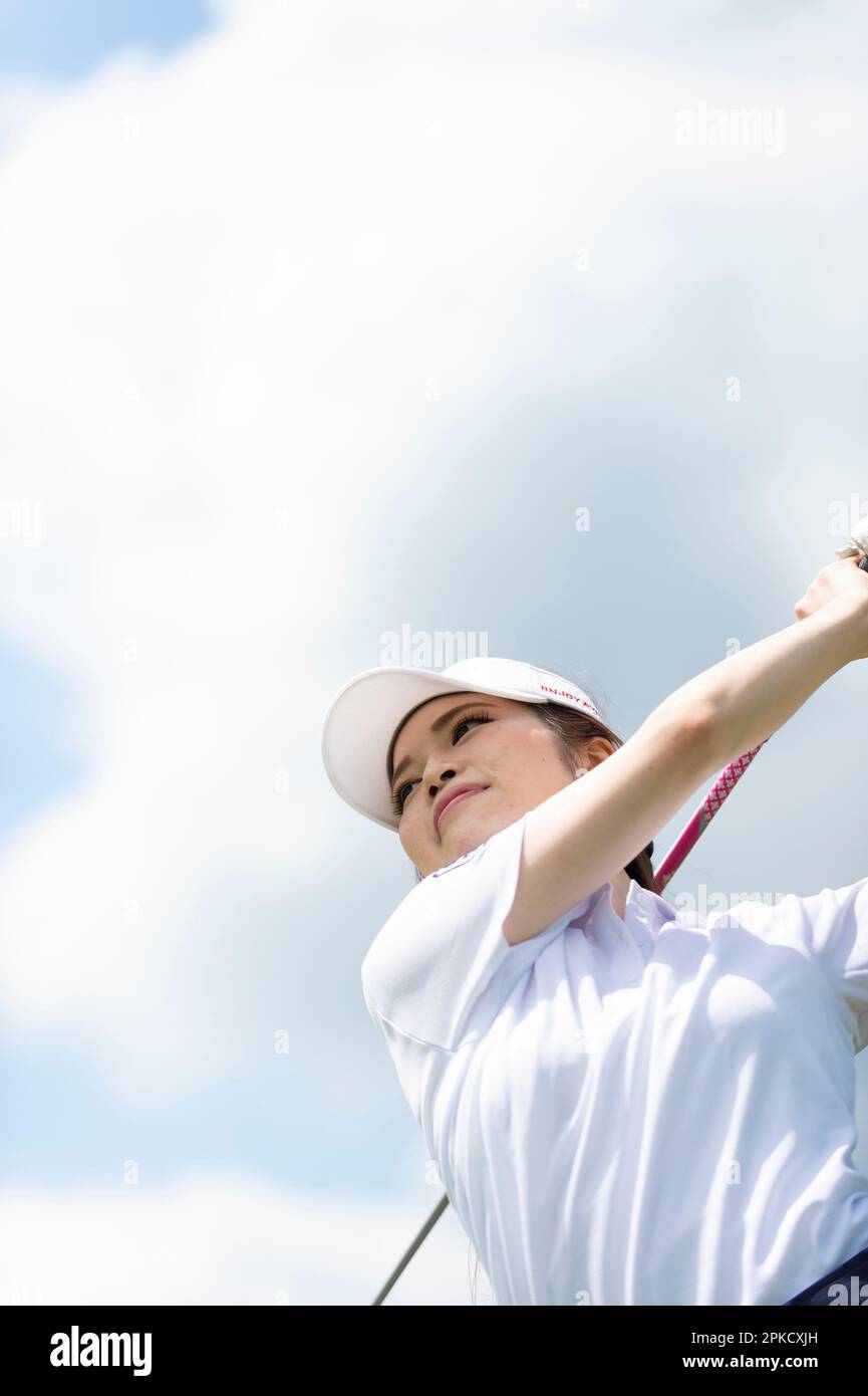 Women in their 20s who play golf Stock Photo