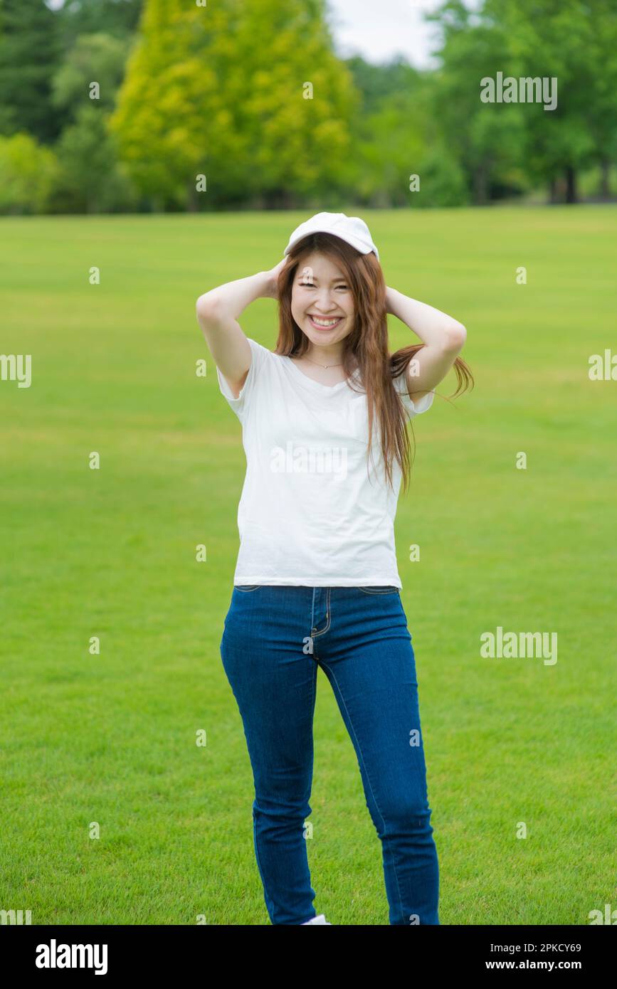 Woman in her 20s at the park Stock Photo