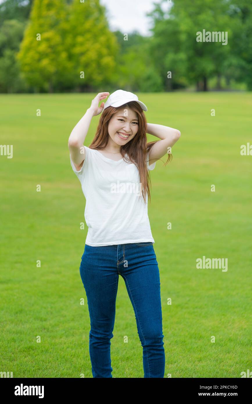 Woman in her 20s at the park Stock Photo