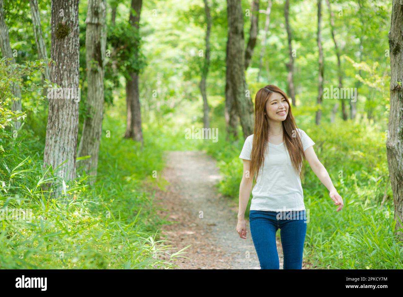 20s woman in forest Stock Photo
