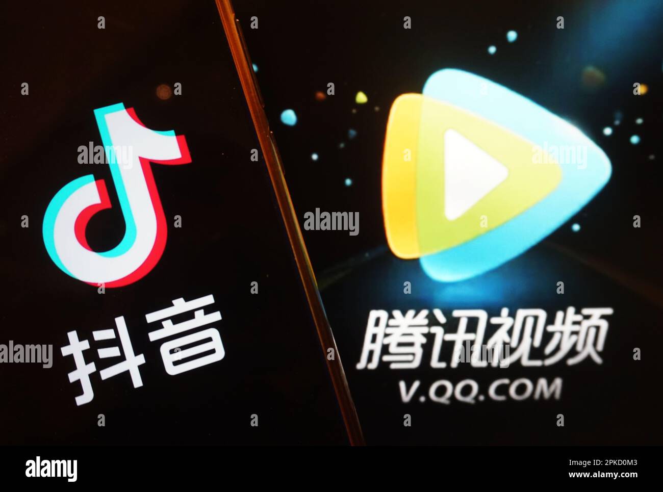 HANGZHOU, CHINA - APRIL 7, 2023 - The logos of TikTok and Tencent Video are pictured in Hangzhou, Zhejiang province, China, April 7, 2023. On the same Stock Photo