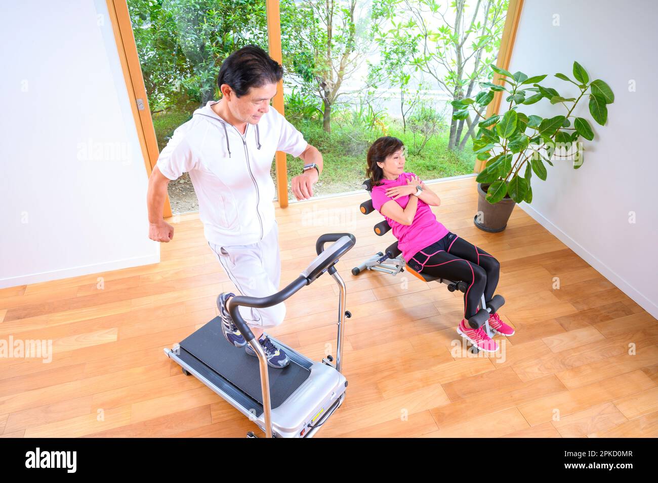 Asian middle couple age jogging hi-res stock photography and images - Alamy