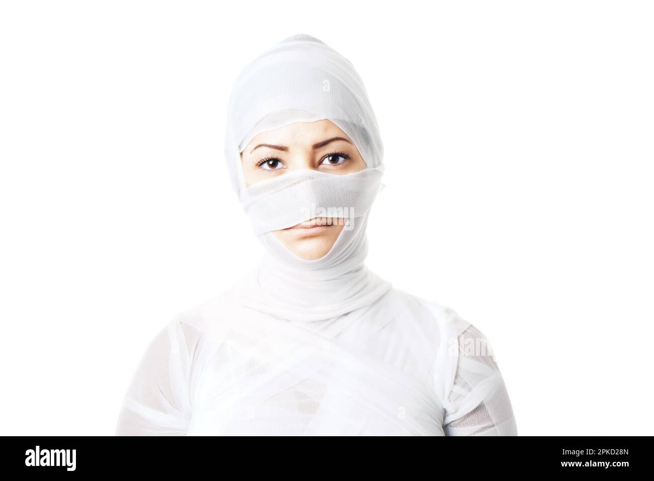 female cosmetic surgery patient wrapped in bandages looking like a mummy Stock Photo