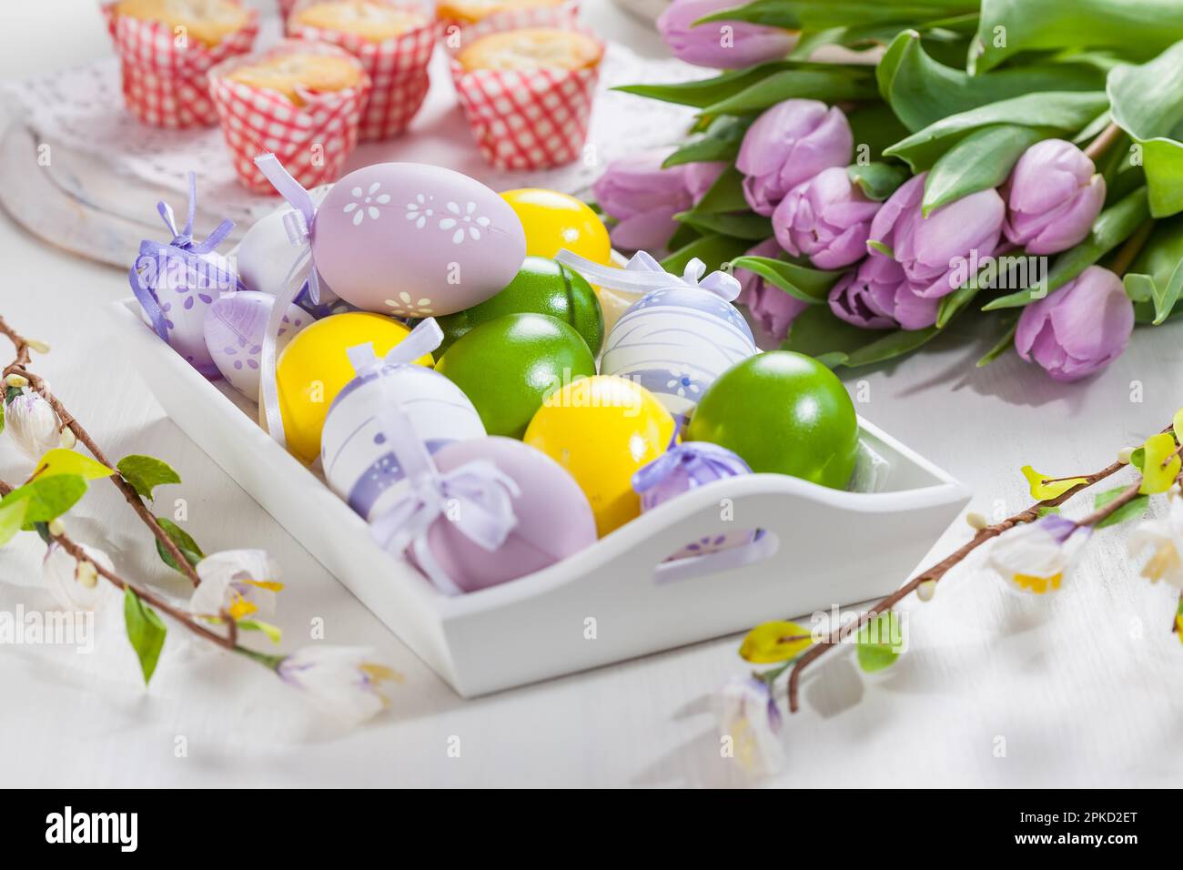 Easter table setting with painted eggs Stock Photo