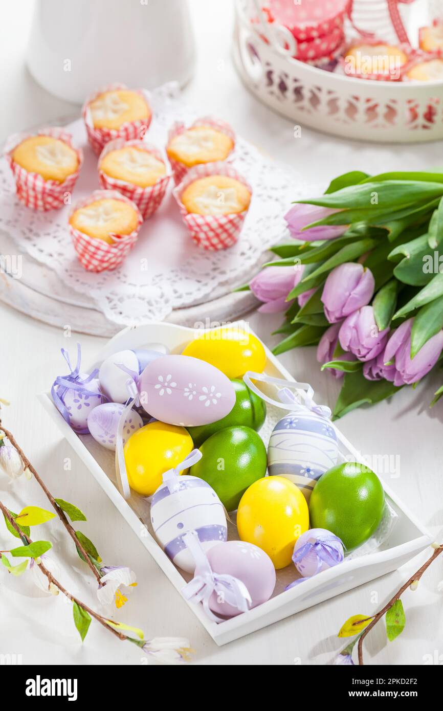 Easter table setting with painted eggs Stock Photo