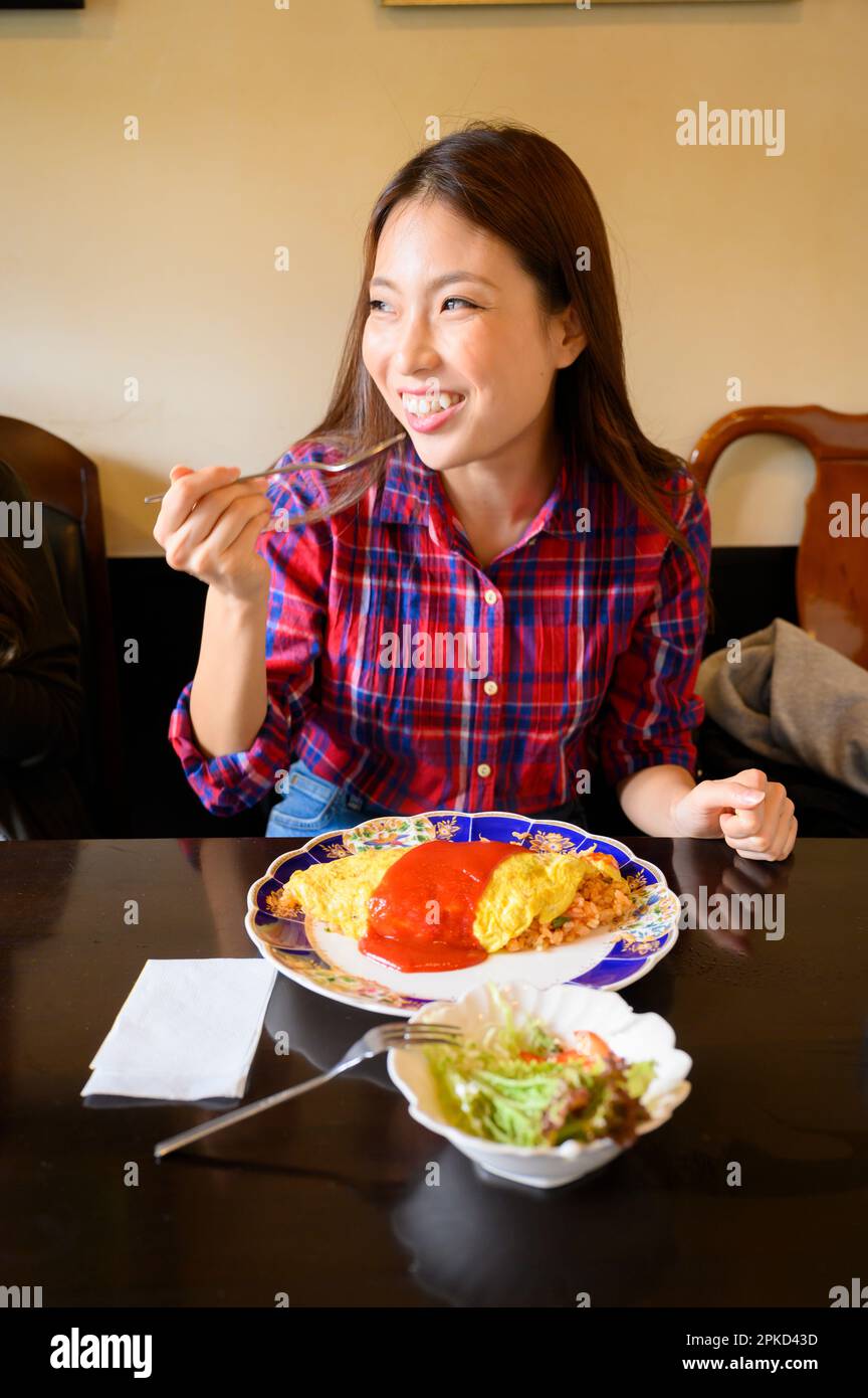 Women having lunch at a cafe Stock Photo