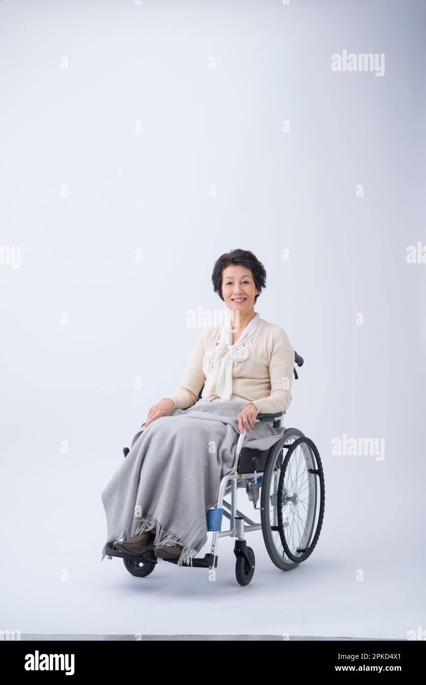 Happy person in wheelchair hi-res stock photography and images - Alamy