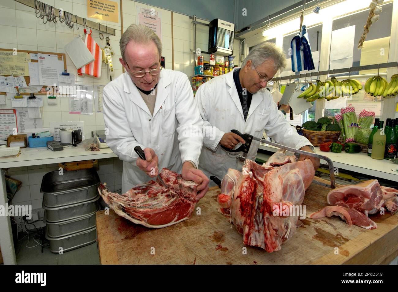 Butchers, boning of beef loin and cutting of lamb, S. W. Doughty's Butchers, Doddington, Kent, England, Great Britain Stock Photo