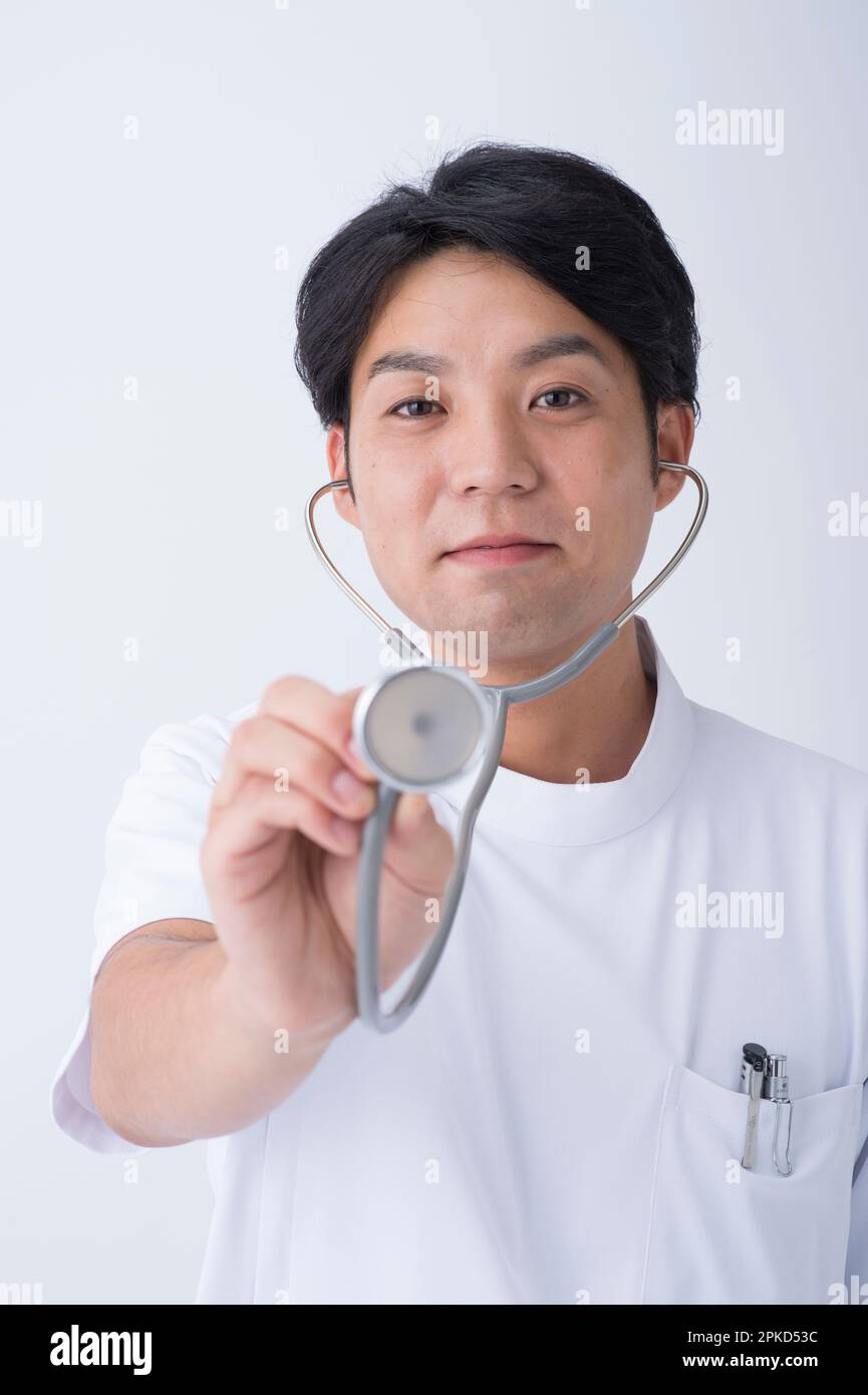 Doctors with hearing aids Stock Photo Alamy