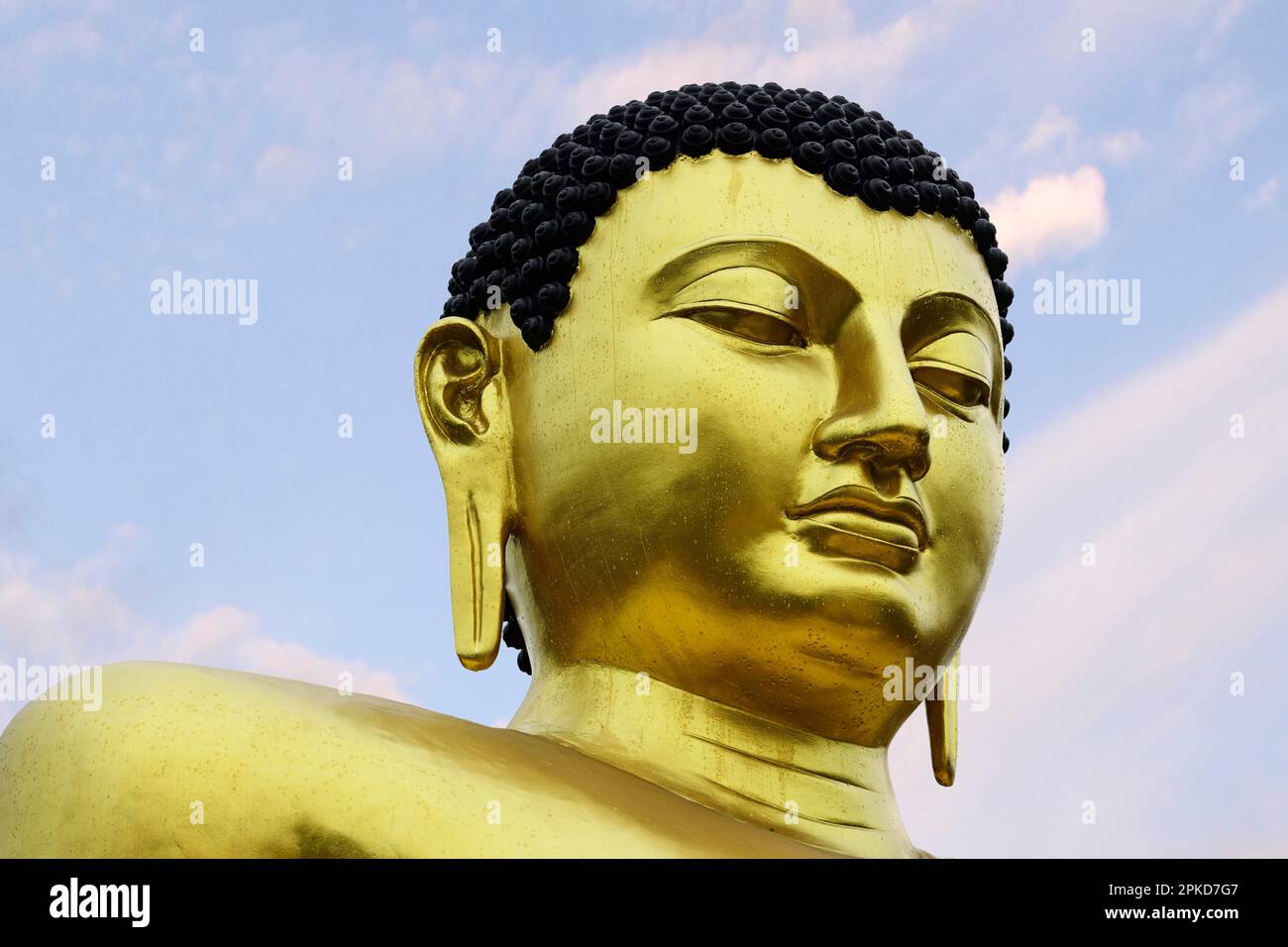 Golden Buddha statue in Viharamahadevi Park in the centre of Colombo