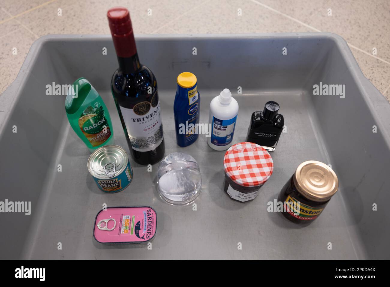 City Airport in London shows passengers now able to travel without removing liquids from their hand luggage, Stock Photo