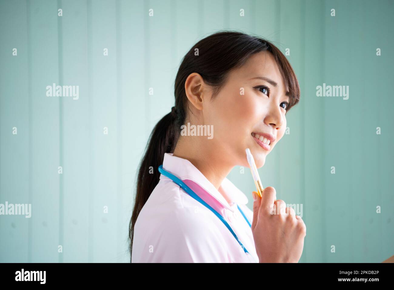 Woman in uniform thinking Stock Photo Alamy