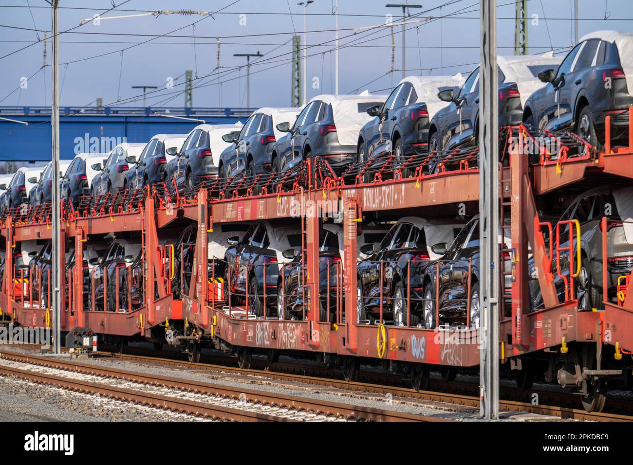 Car train, goods train on its way to the car terminal in the seaport of