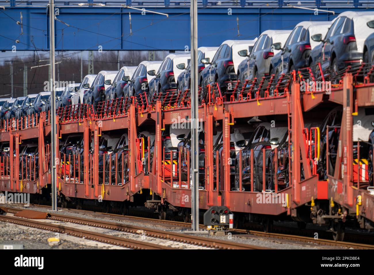 Car train, goods train on its way to the car terminal in the seaport of
