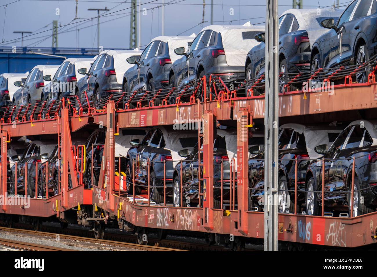 Car train, goods train on its way to the car terminal in the seaport of