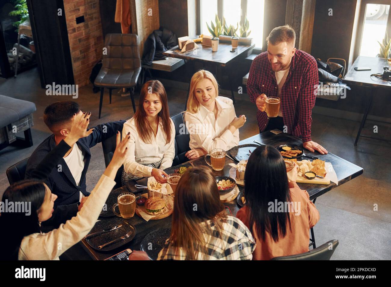 Group people standing at bar hi-res stock photography and images - Alamy